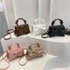 Bow attached bag for women in Bangladesh with button closure and single chamber from RedBag BD