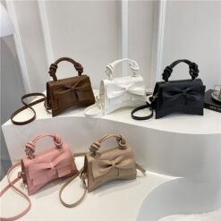 Bow attached bag for women in Bangladesh with button closure and single chamber from RedBag BD